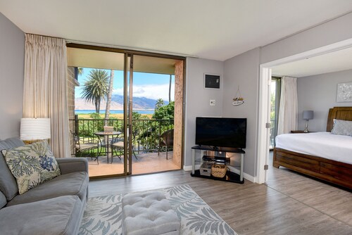 Oceanfront oasis with beach access, pool, & balcony