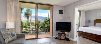 Oceanfront oasis with beach access, pool, & balcony