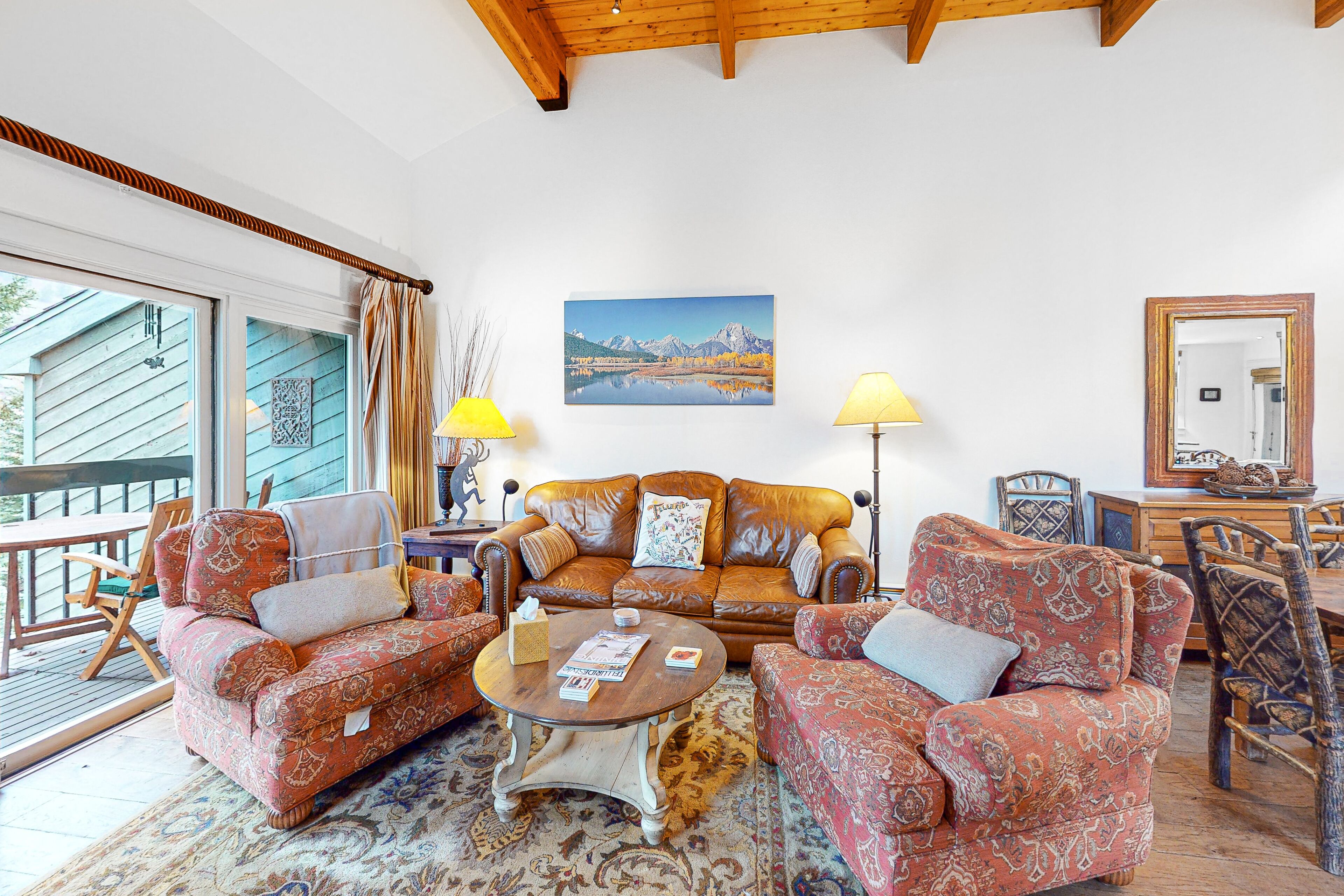 River- & mountain-view condo with fireplace - walk to lifts & Town Park