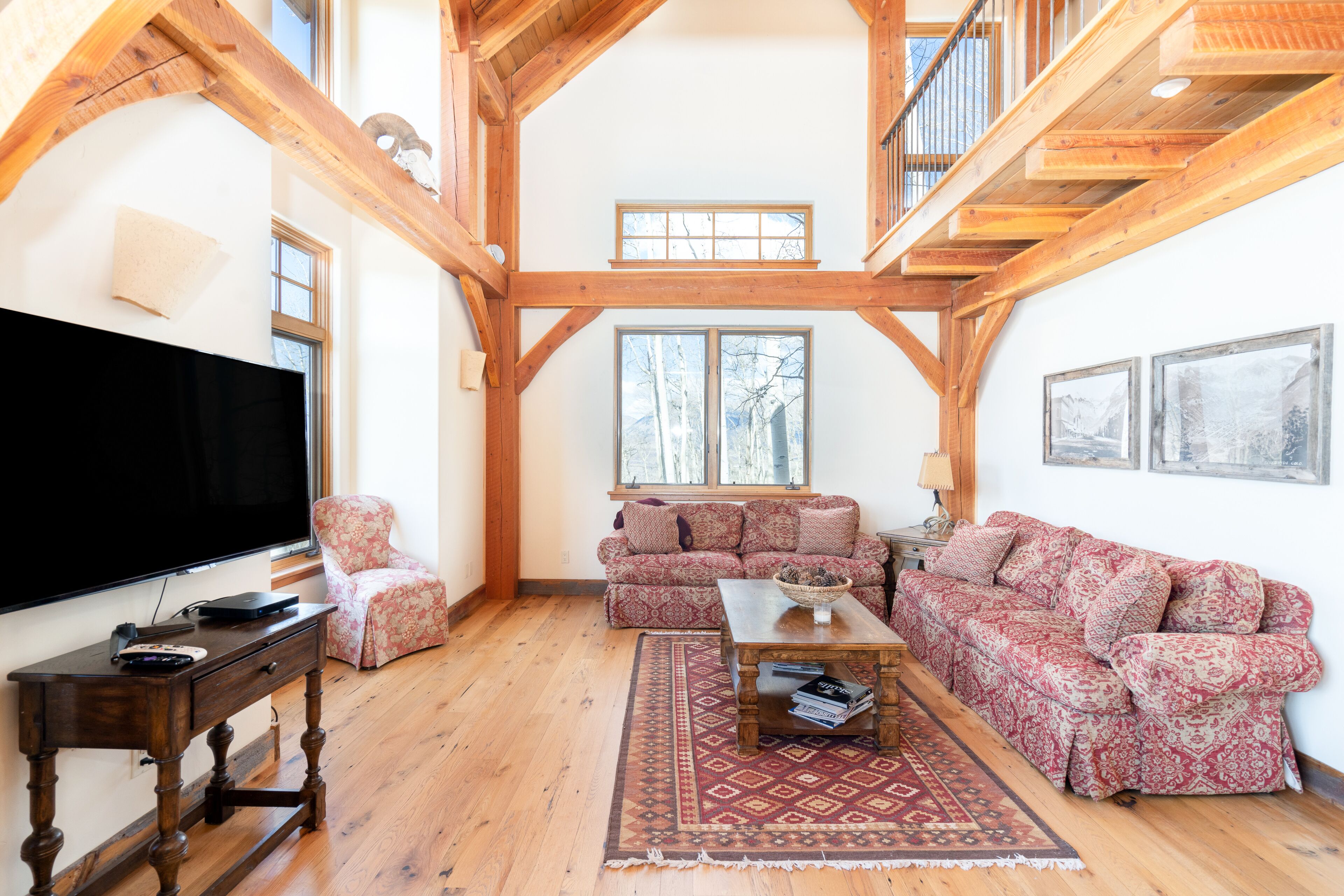 Luxury home with majestic mountain views, private hot tub, fireplace & deck