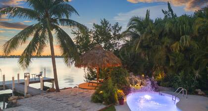 Key West Beach House with heated pool, tiki, and dock.♿︎