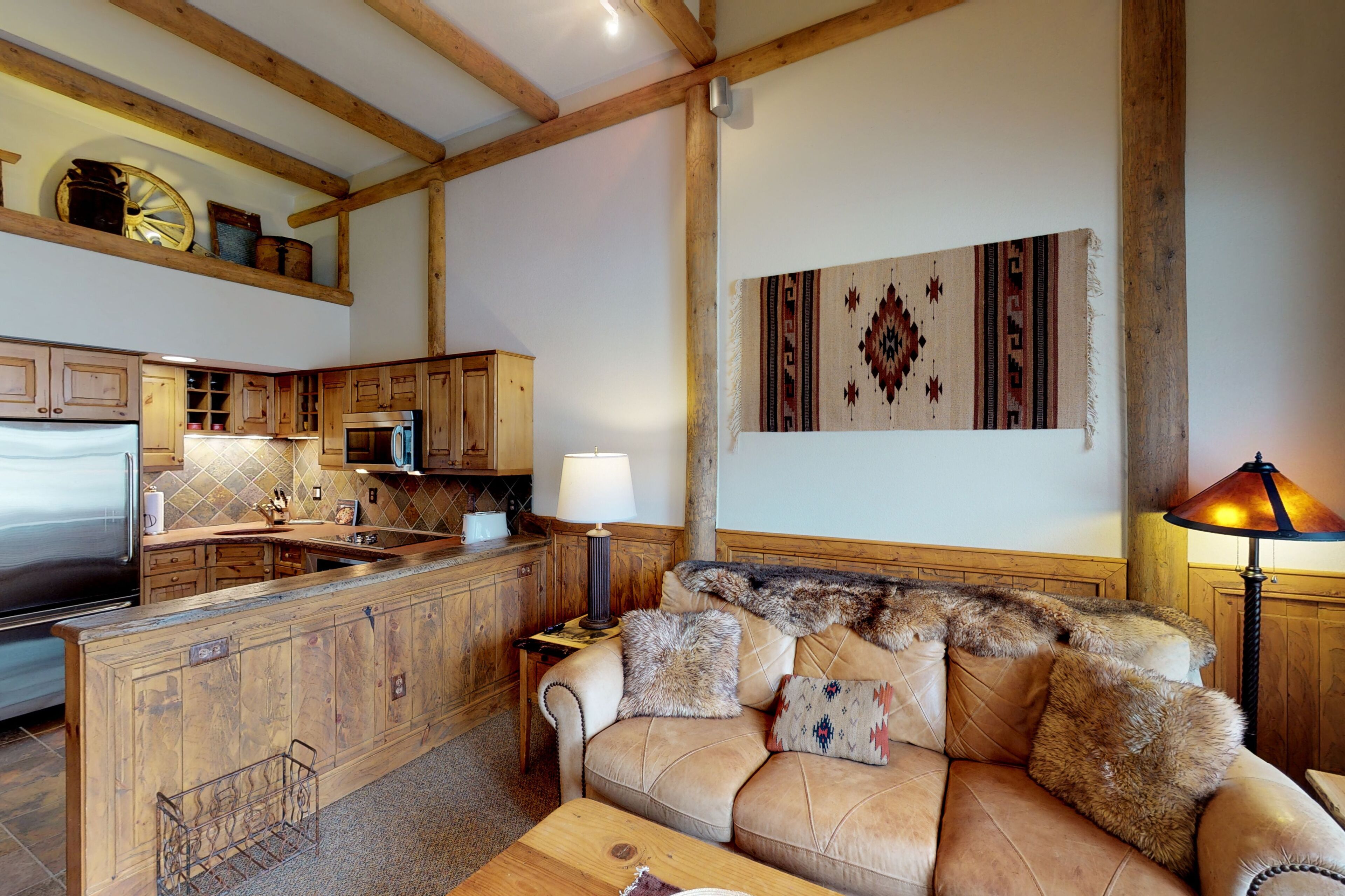 Two-story, ski-in/out mountain condo with balcony, washer/dryer & grill