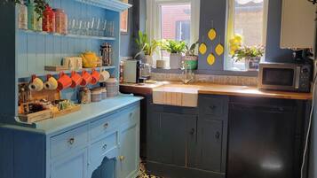 Fridge, microwave, coffee/tea maker, toaster