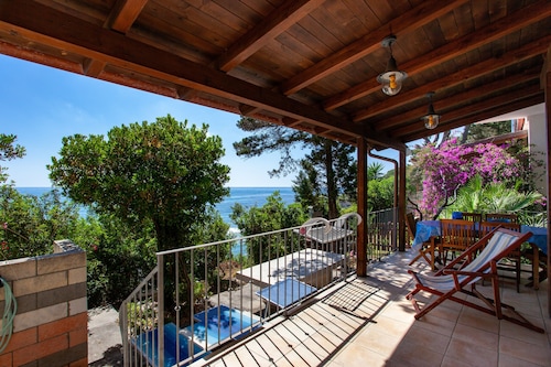 Maison de vacances "Casa Sulla Spiaggia 1" avec vue sur mer, terrasses et jardin