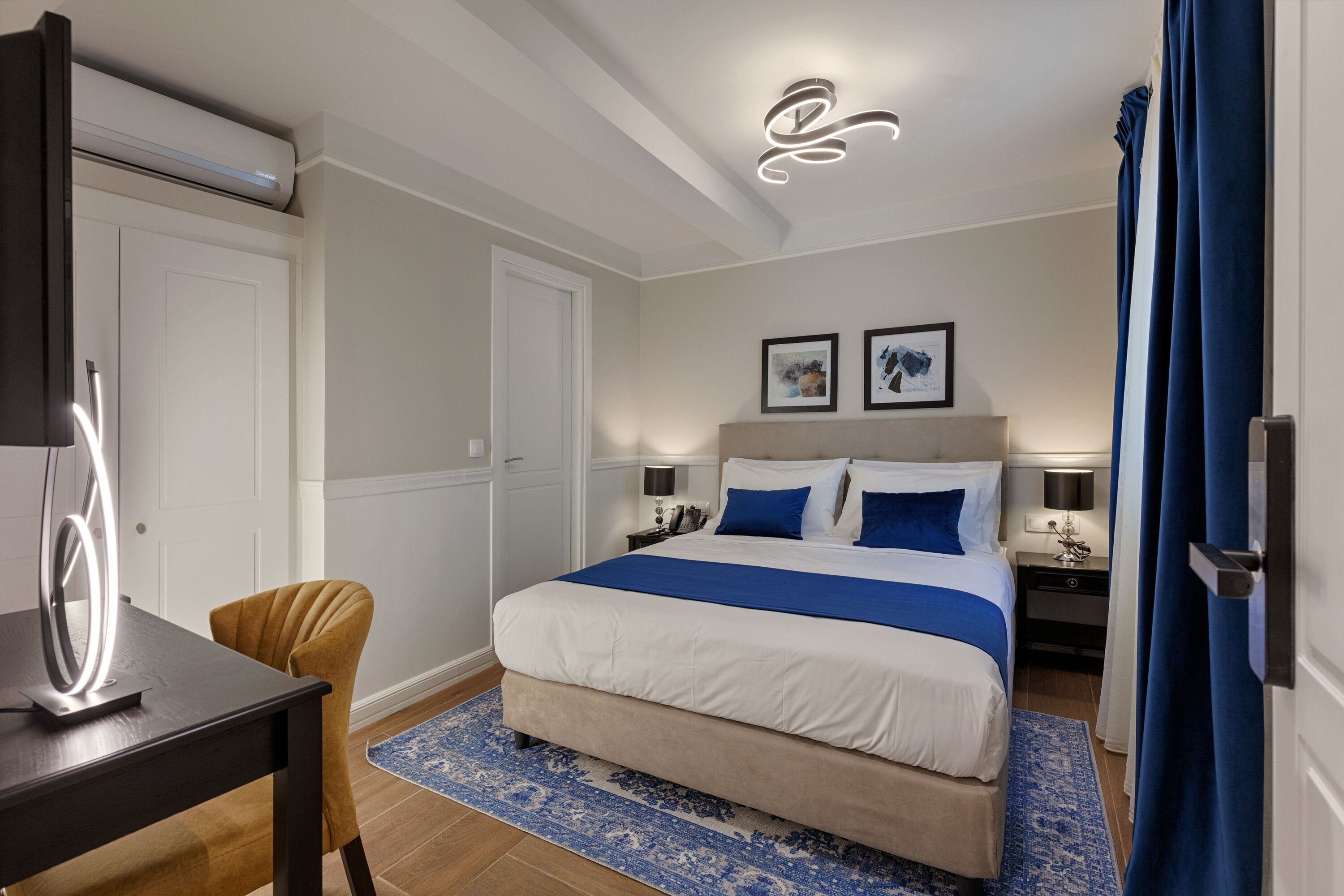 classic double or twin room | in-room safe, desk, laptop workspace, blackout curtains