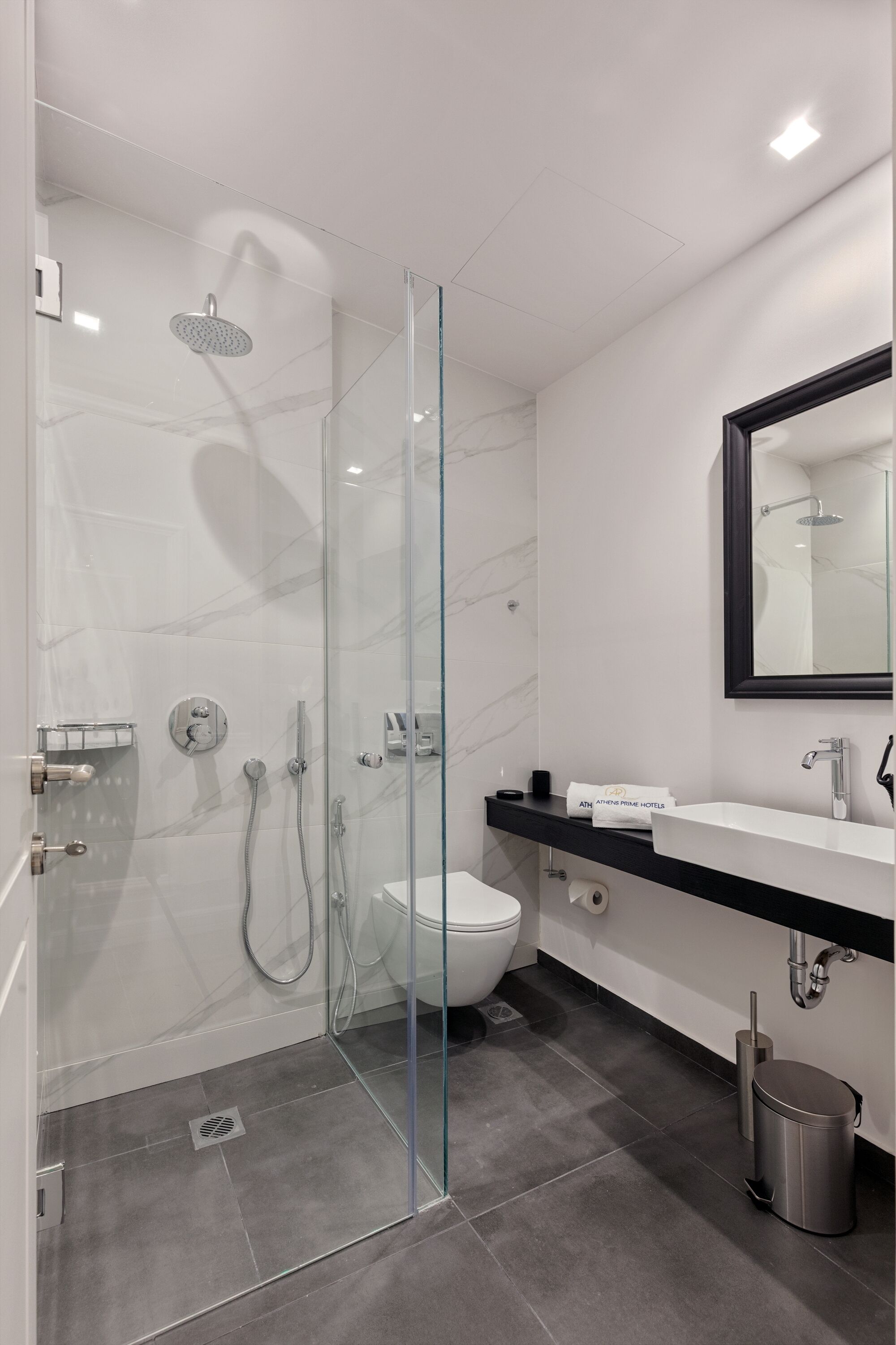 superior double room | bathroom | rainfall showerhead, free toiletries, hair dryer, bidet