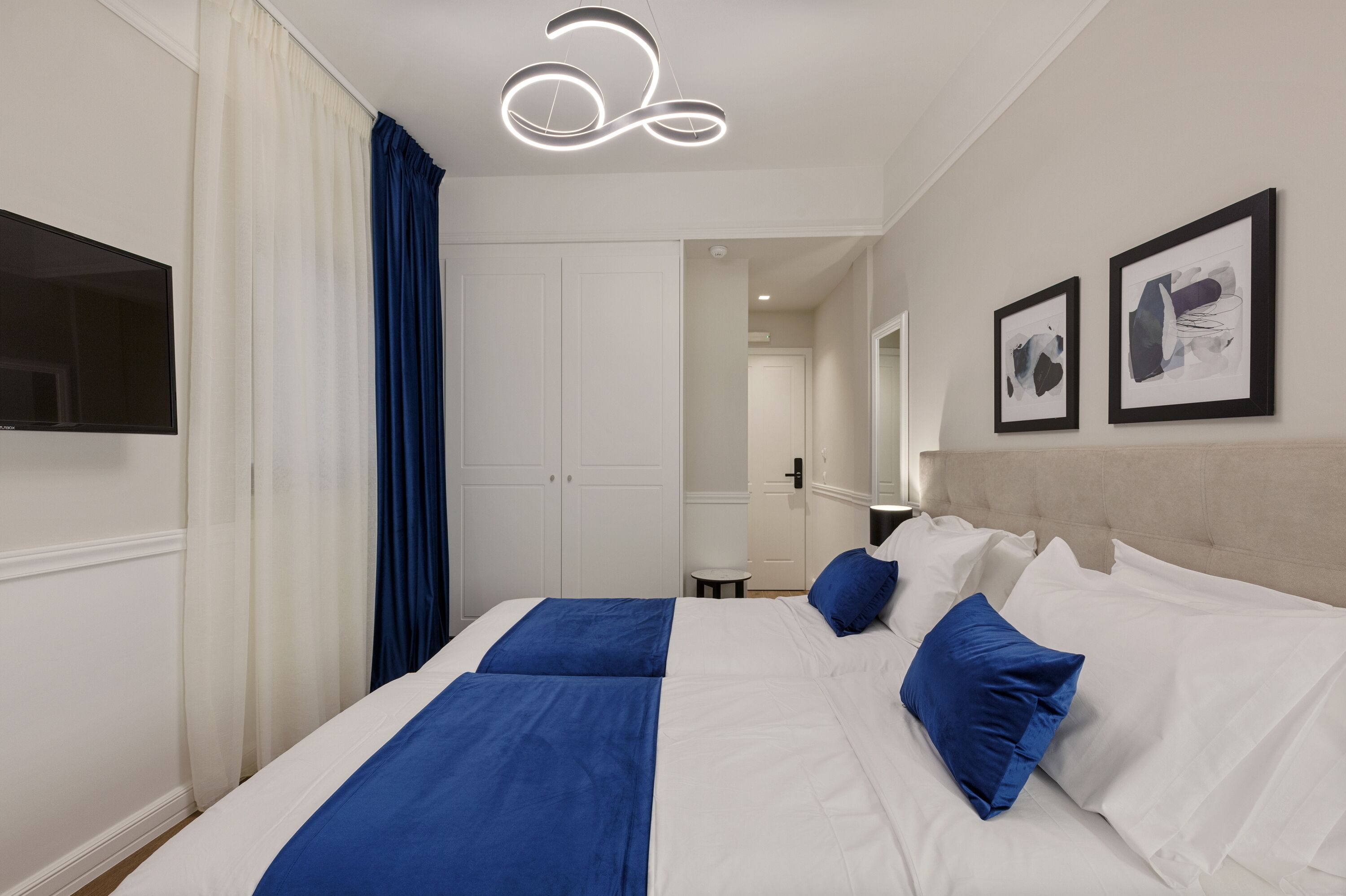 comfort triple room | in-room safe, desk, laptop workspace, blackout curtains