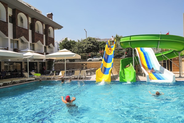 Seasonal outdoor pool, pool umbrellas, pool loungers