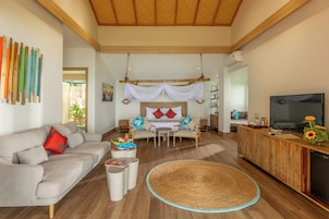 Bungalow, 1 cama de matrimonio grande, frente a la playa | Minibar, caja fuerte, escritorio y sistema de insonorización