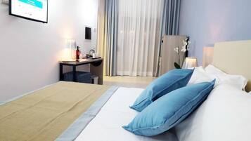 Minibar, in-room safe, individually decorated, desk