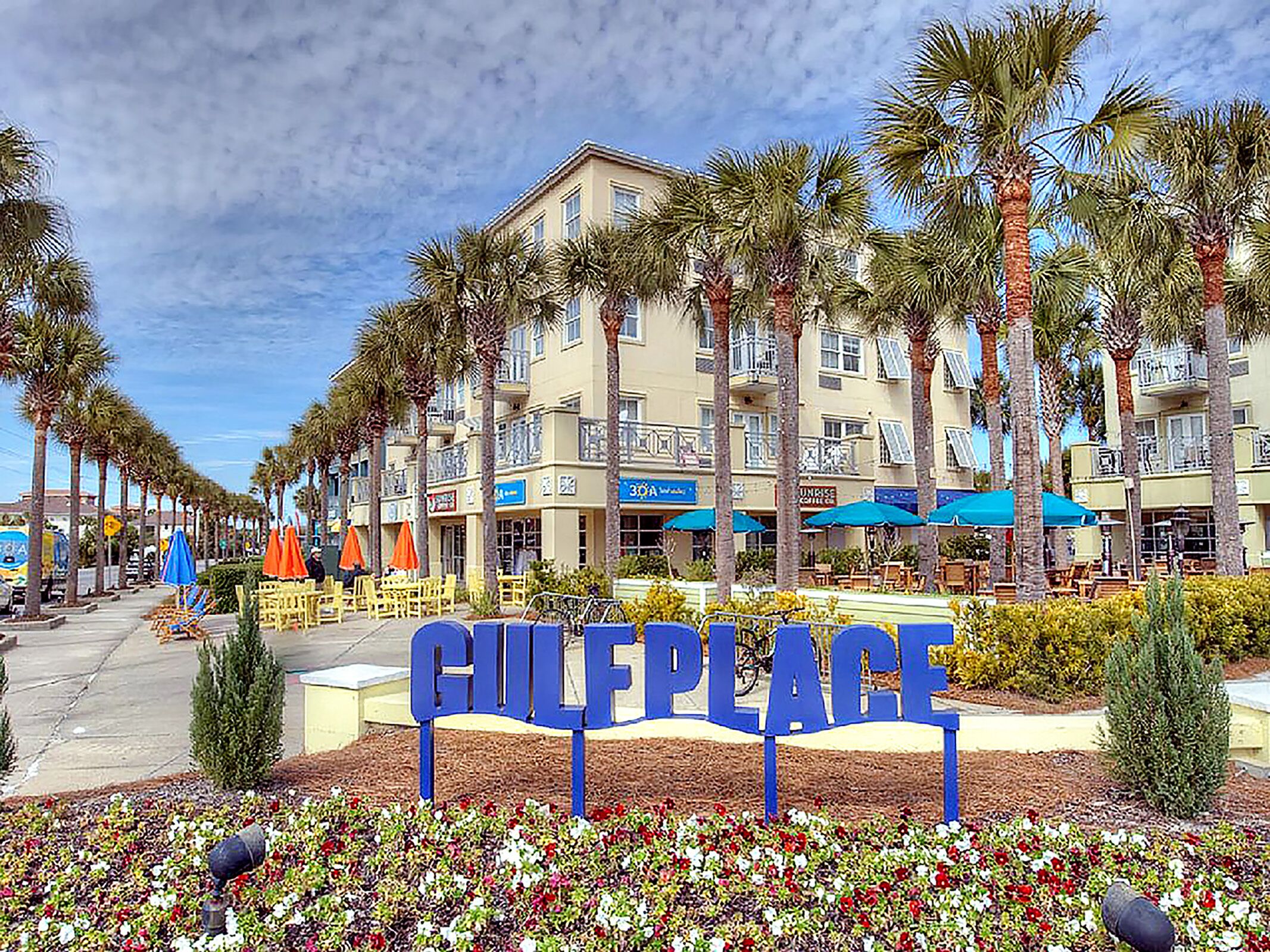 A beachfront hotel with a sign reading "GULFPLACE". - ☀️Pool+Nature Trails-30A-1st Floor-Sandy Feet Retreat☀️ (SANTA RSA BCH)