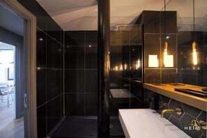 Shower, hair dryer, towels, shampoo