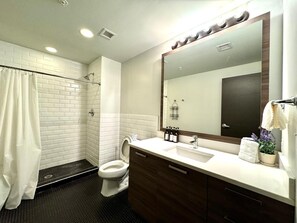Bathtub, hair dryer, towels