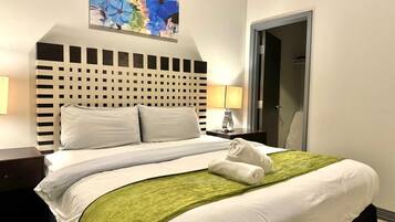 2 habitaciones, tabla de planchar con plancha y cuna de viaje