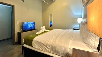 2 habitaciones, tabla de planchar con plancha y cuna de viaje