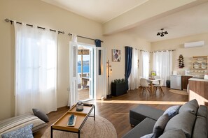 Panoramic Apartment | Living area | Flat-screen TV - Rementzo Apartment (Symi)