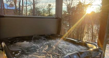 Walk to the water log cabin, access to dock, hot tub, fire pit, grill, spacious