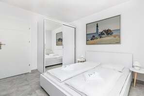 3 quartos, individualmente decorados, espaço de trabalho para notebook