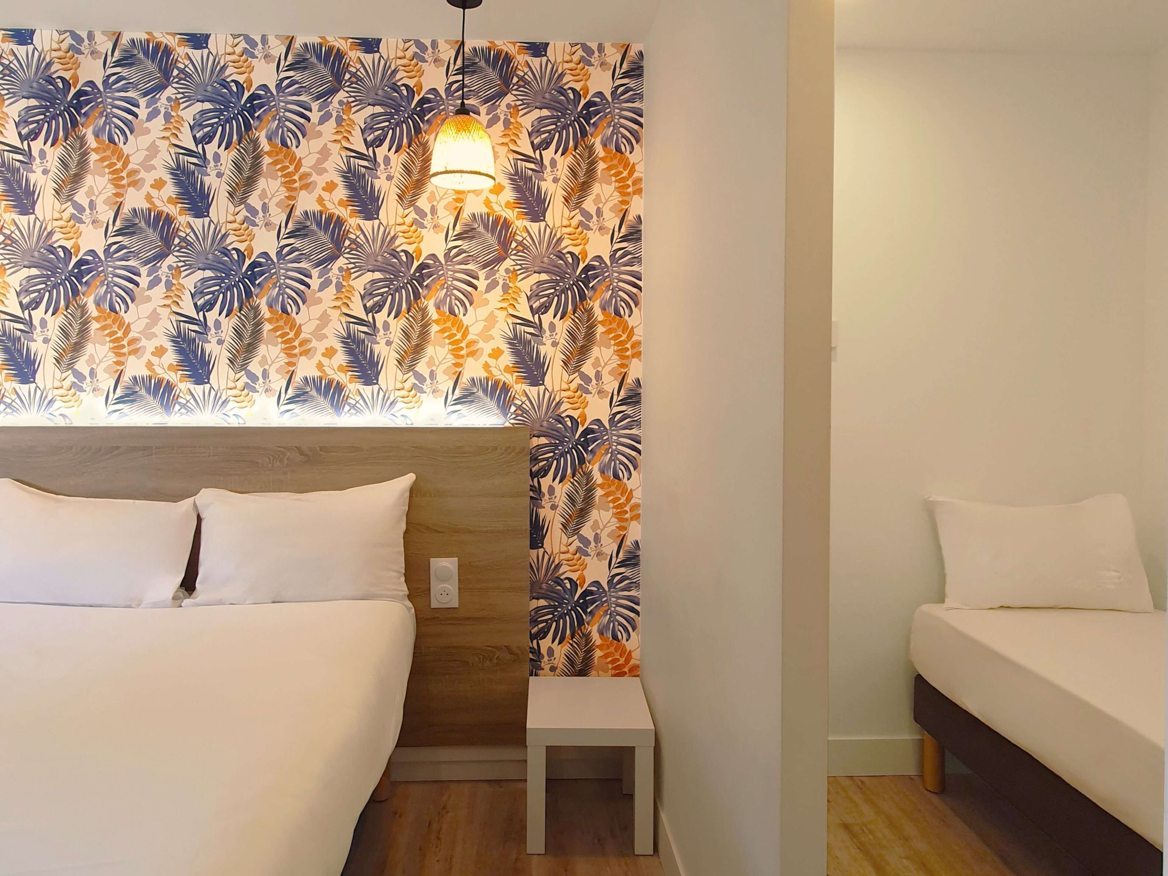 family room, multiple beds | laptop workspace, soundproofing, free wifi, bed sheets