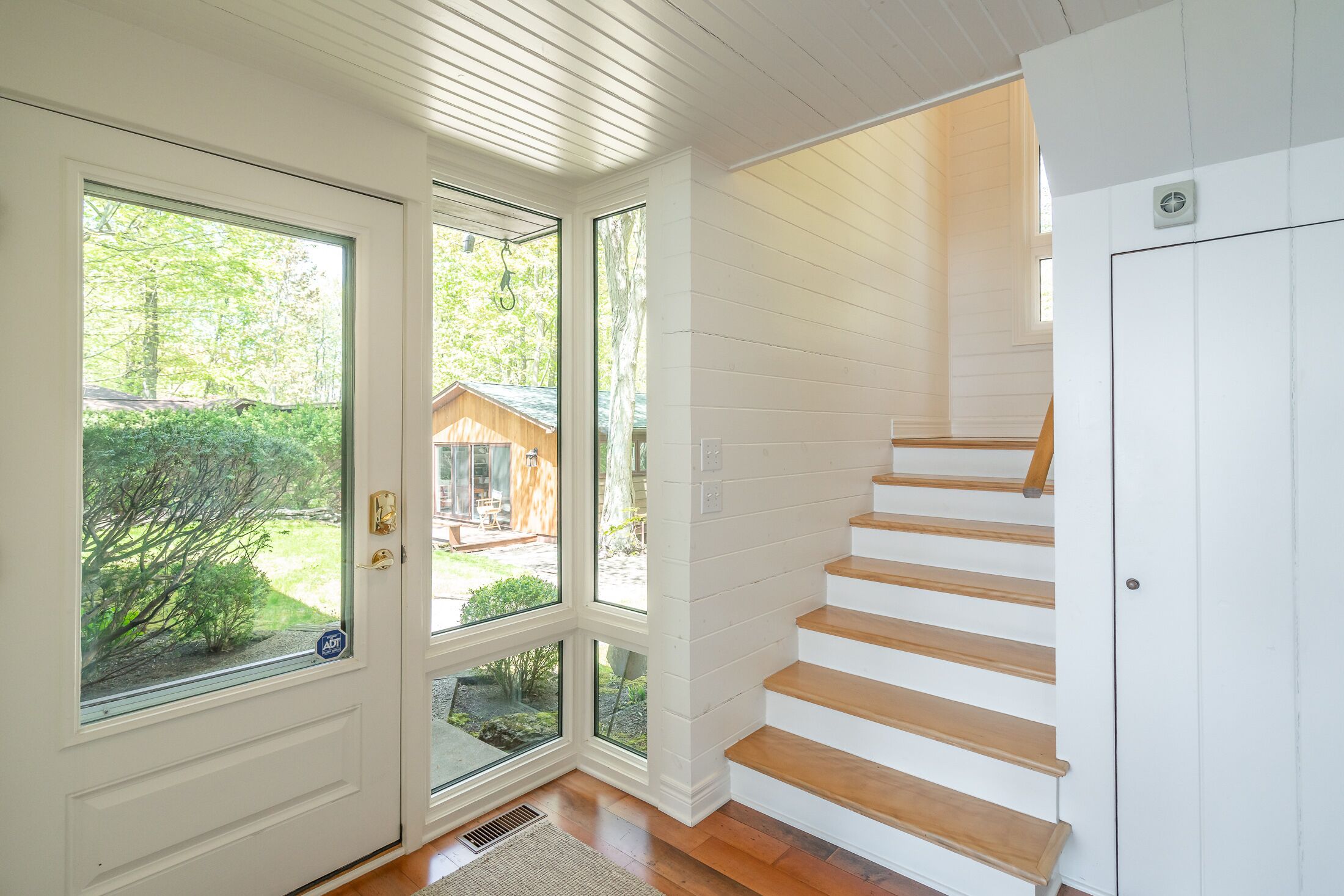 entrance and stairs to second floor of main house 