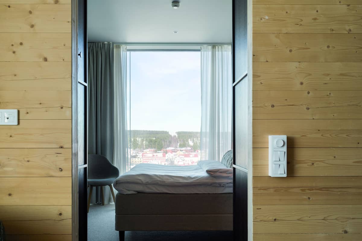 family room | 1 bedroom, minibar, in-room safe, iron/ironing board