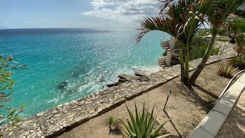On the beach, sun-loungers, beach towels