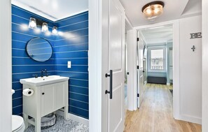 Combined shower/tub, hair dryer, towels, toilet paper