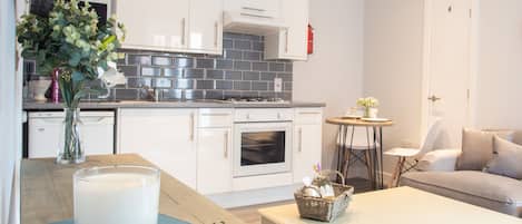 Appartement, accessible aux personnes à mobilité réduite, salle de bains privée | Cuisine partagée