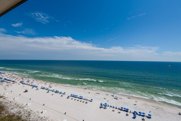 Relax on the beach with comfortable sun loungers and umbrellas, surrounded by the soothing sound of the ocean.