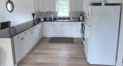 SECLUDED WOODLAND ESCAPE NEAR WISCONSIN DELLS WITH POND ON 80 PRIVATE ACRES
