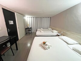 Economy Triple Room | Minibar, free WiFi, bed sheets