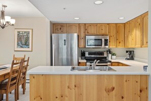 Fridge, microwave, oven, stovetop - Spacious 2BR | Steps from Village | Shared Hot Tub | Free Parking | Managed by Aloha Whistler (Whistler)