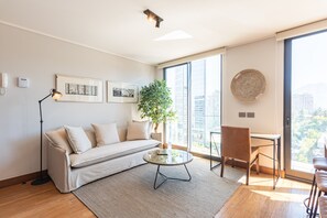 Basic Apartment | Living room | 40-inch LED TV with digital channels, TV, Netflix - Uptown Luxe (Santiago)
