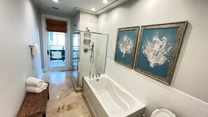 Bathtub, hair dryer, towels, soap