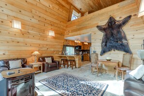 Televisio, takka, pöytätennispöytä, kirjoja