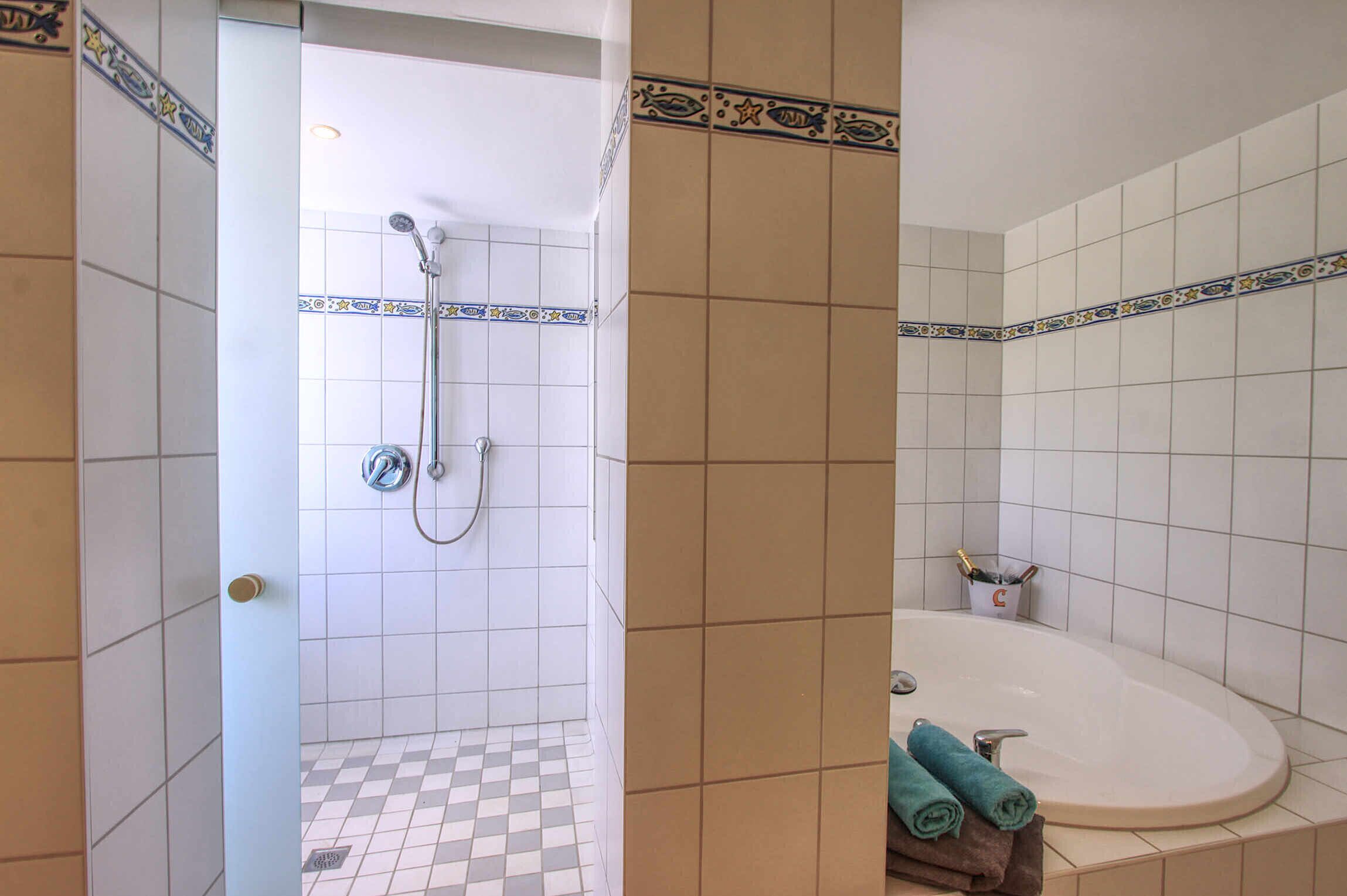 Bathtub, hair dryer, towels