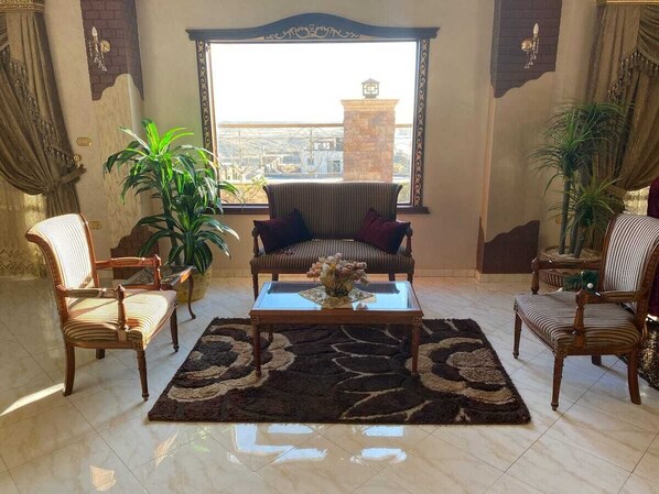 Penthouse Panoramique | Coin séjour | Cheminée