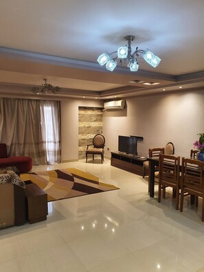 TV - Charming 3-Bed Apartment in New Cairo City (New Cairo City)