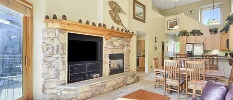 Flat-screen TV, fireplace