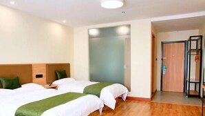 A hotel room with two beds, wooden flooring, and a wardrobe. - Greentree Inn Shaoxing Xinchang Dafou Express Hotel (Shaoxing)