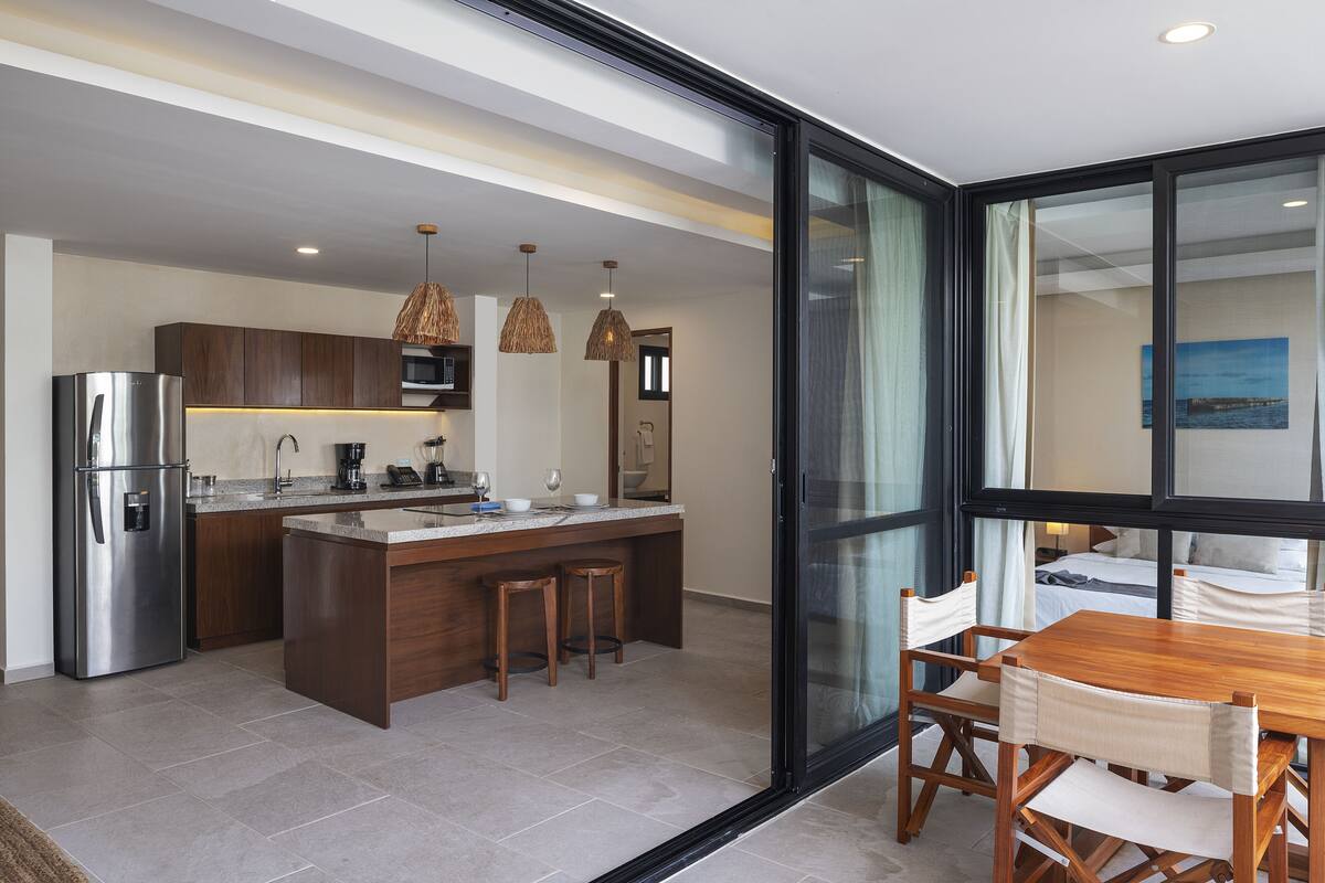 deluxe studio with large balcony | hypo-allergenic bedding, down duvets, in-room safe, blackout curtains