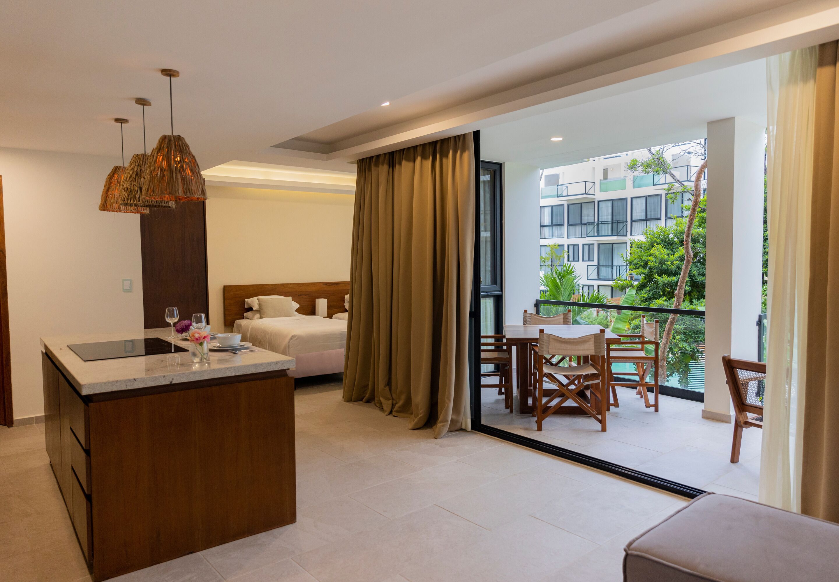 deluxe studio with large balcony | hypo-allergenic bedding, down duvets, in-room safe, blackout curtains