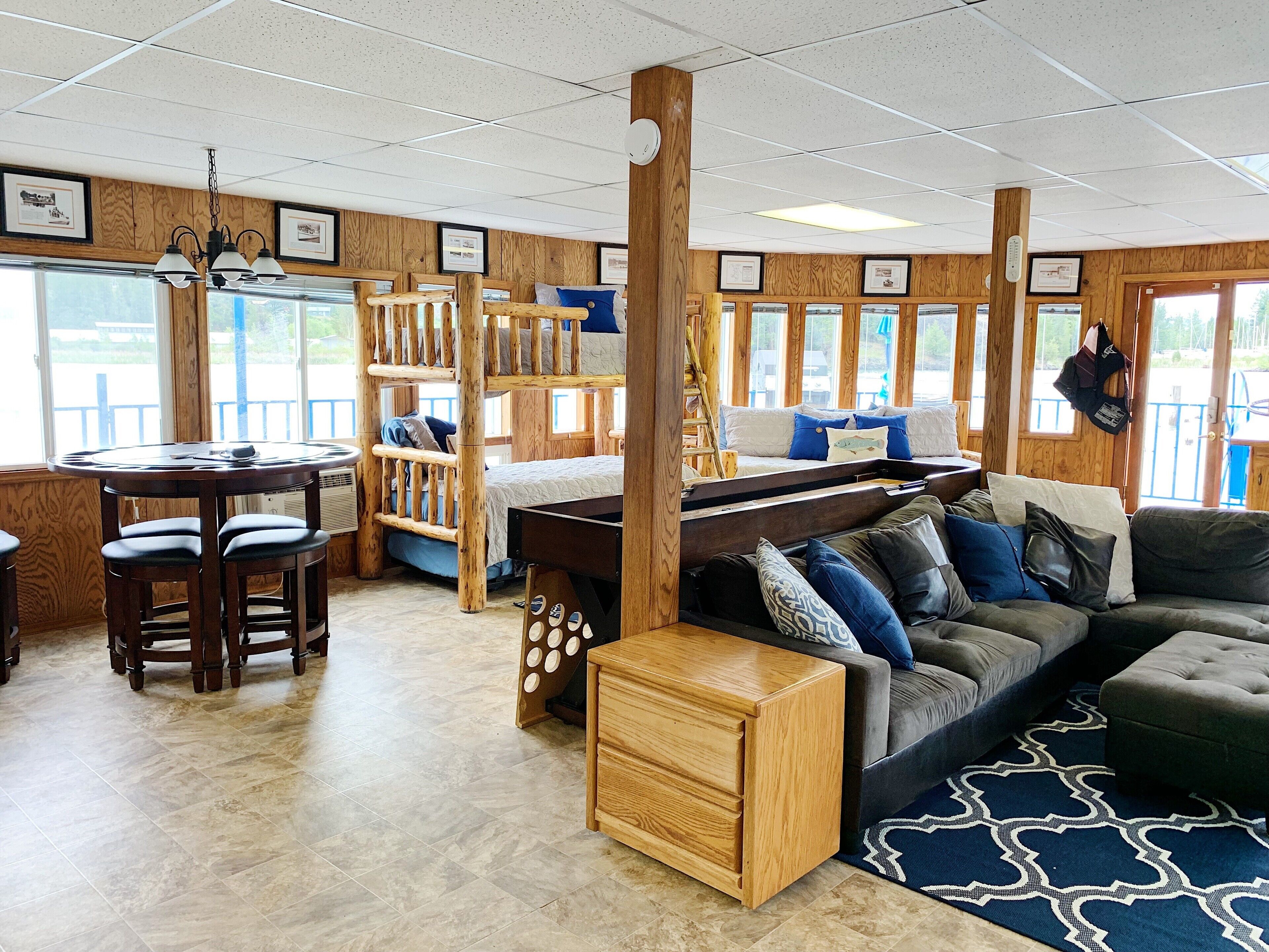 FLOATING HOUSE on Flathead Lake with waterslide, kayaks, rooftop deck, and more