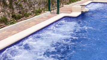 Seasonal outdoor pool, open 10:00 AM to 9:00 PM, sun loungers