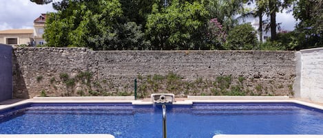 Seasonal outdoor pool, open 10:00 AM to 9:00 PM, sun loungers