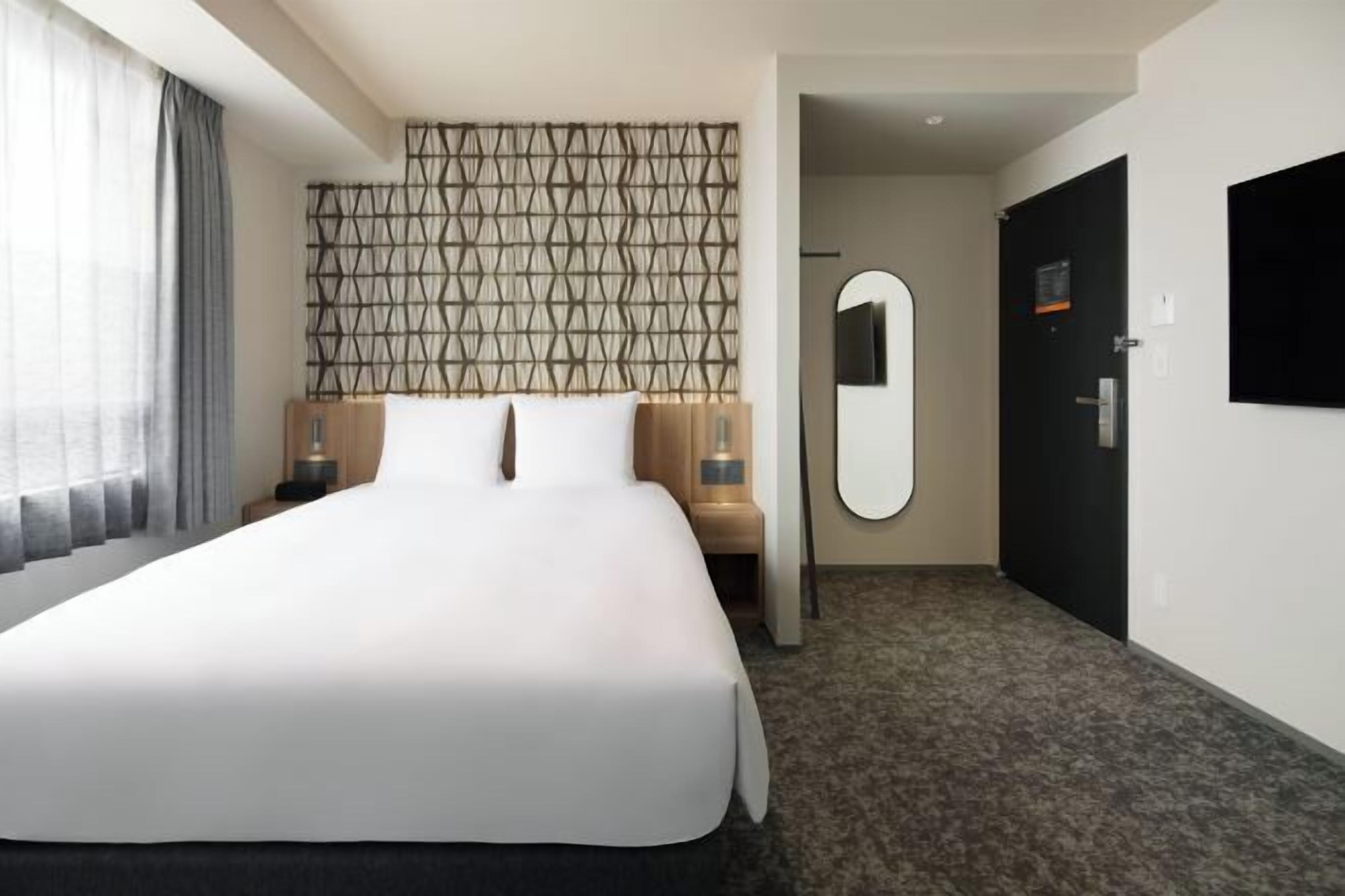 In-room safe, laptop workspace, blackout curtains, iron/ironing board