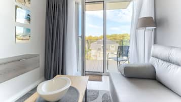 Apartment, 1 Schlafzimmer (44) | Wohnbereich | 50-Zoll-LED-Fernseher mit Kabelempfang, Fernseher