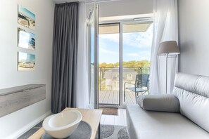 Apartemen, 1 kamar tidur (44) | Area keluarga | Televisi LED 50-inci dengan saluran TV kabel dan TV