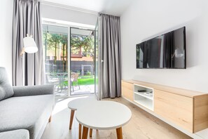 Apartemen, 1 kamar tidur (3) | Area keluarga | Televisi LED 50-inci dengan saluran TV kabel dan TV