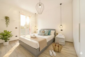 Apartamento, 2 quartos, terraço | 2 quartos, individualmente decorados, individualmente mobiliados
